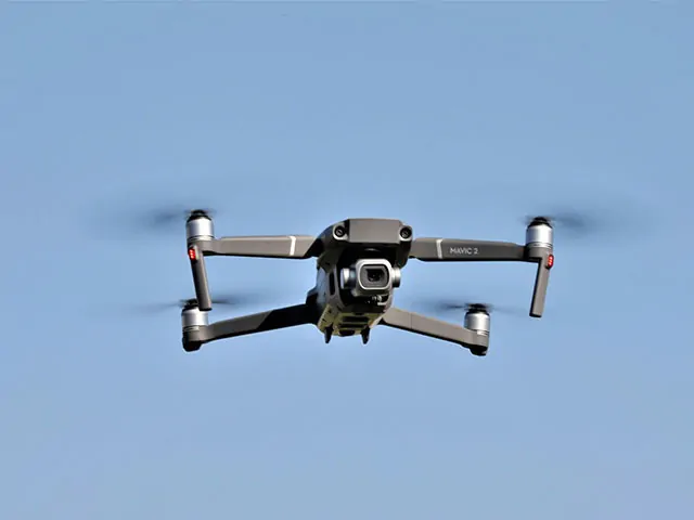 Capture breathtaking aerial views with a drone, highlighting landscapes and unique perspectives from above.